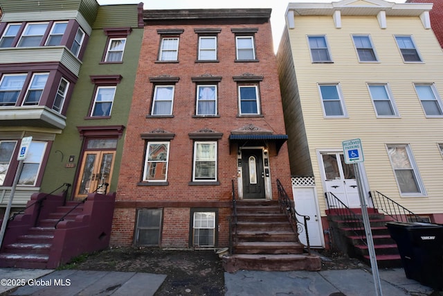 140 3rd St, Troy, NY 12180 - townhome / multi-family property featuring brick siding and entry steps