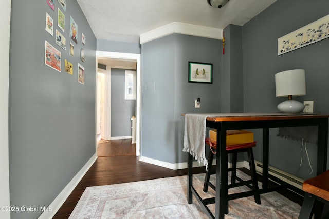 140 3rd St, Troy, NY 12180 - office featuring wood finished floors, baseboards, and a baseboard heating unit