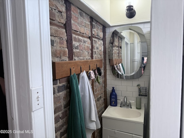 304 Green St, Schenectady, NY 12305 - bathroom featuring vanity and tasteful backsplash