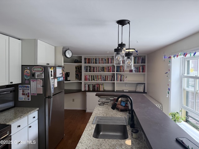 304 Green St, Schenectady, NY 12305 - kitchen featuring a sink, freestanding refrigerator, white cabinets, dark wood-type flooring, and open shelves