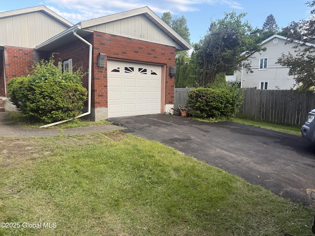 63 Ormond St, Albany, NY 12203 - garage featuring asphalt driveway