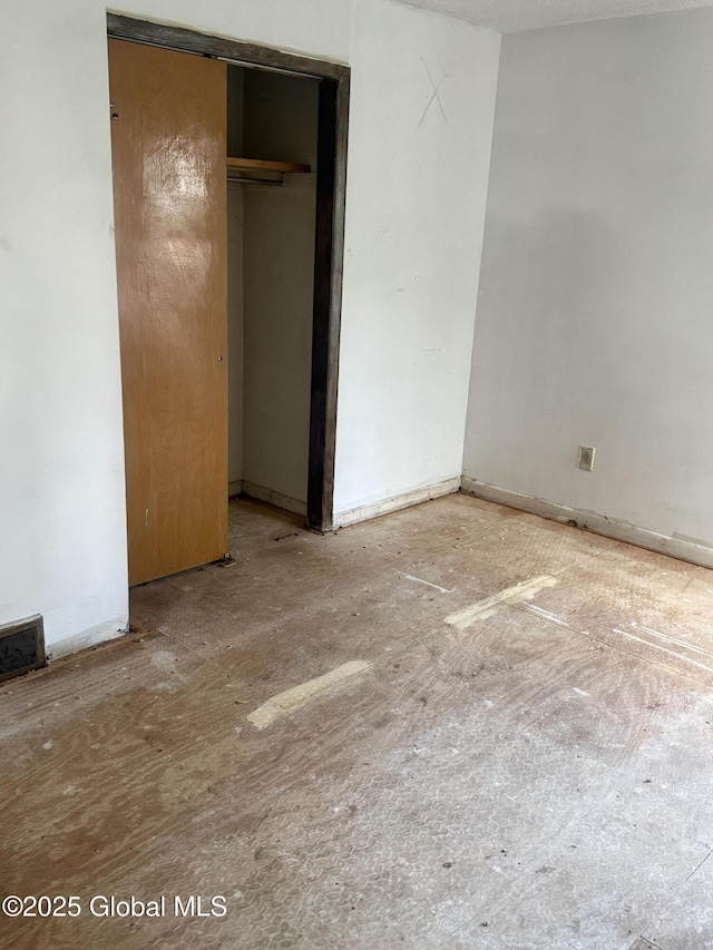 63 Ormond St, Albany, NY 12203 - unfurnished bedroom with a closet and baseboards