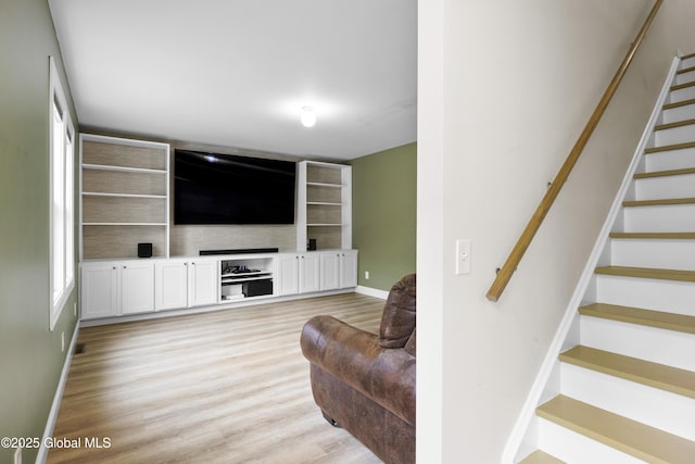 7 Camp Ter, Guilderland, NY 12203 - living room featuring stairs and light wood finished floors