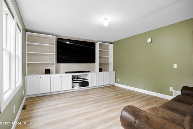 7 Camp Ter, Guilderland, NY 12203 - living room featuring baseboards and light wood-style flooring