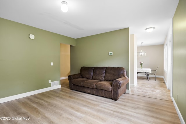 7 Camp Ter, Guilderland, NY 12203 - living room featuring light wood-style flooring and baseboards