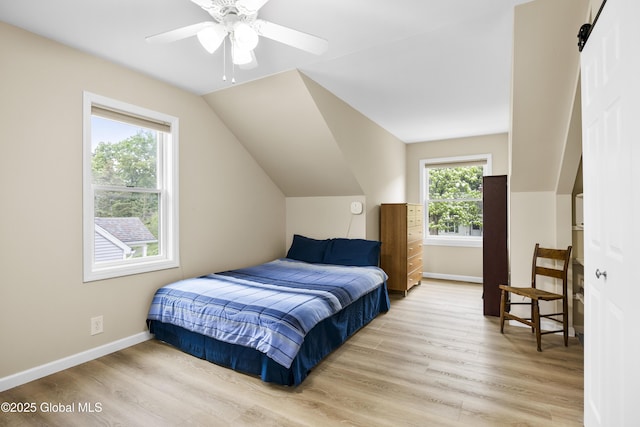 7 Camp Ter, Guilderland, NY 12203 - bedroom featuring light wood-type flooring, vaulted ceiling, and a ceiling fan