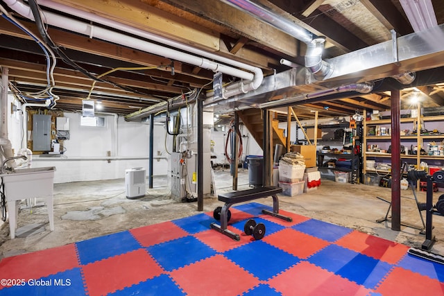 7 Camp Ter, Guilderland, NY 12203 - basement with electric panel and a sink
