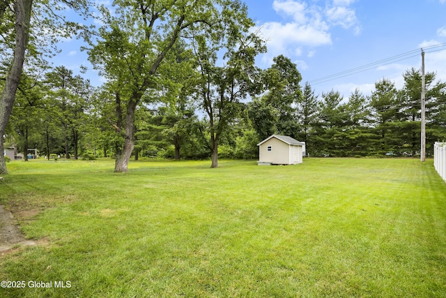 7 Camp Ter, Guilderland, NY 12203 - view of grassy yard featuring a storage unit