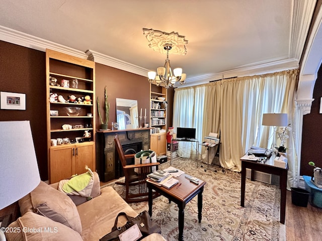 369 Madison Ave, Albany, NY 12210 - living room featuring crown molding, a chandelier, a fireplace, wood finished floors, and an office area