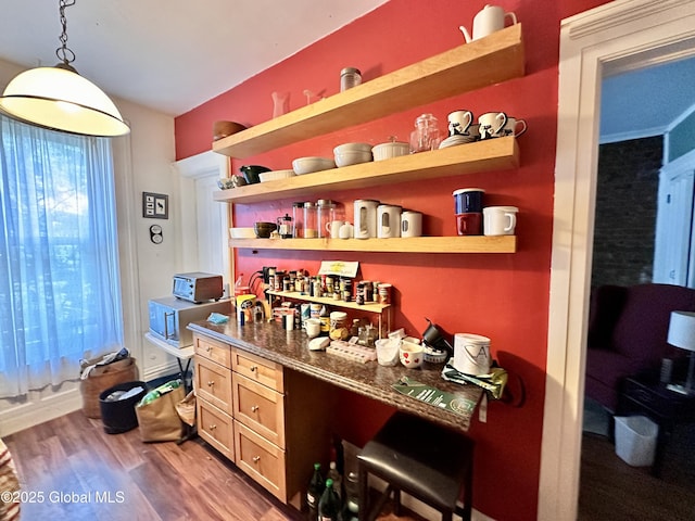 369 Madison Ave, Albany, NY 12210 - bar area featuring wood finished floors and pendant lighting