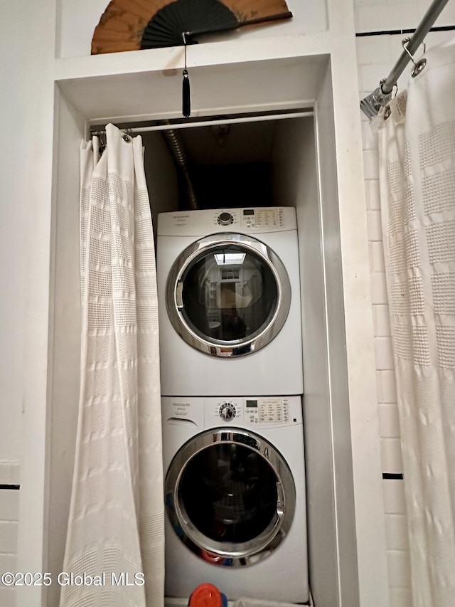 369 Madison Ave, Albany, NY 12210 - washroom featuring stacked washer / dryer