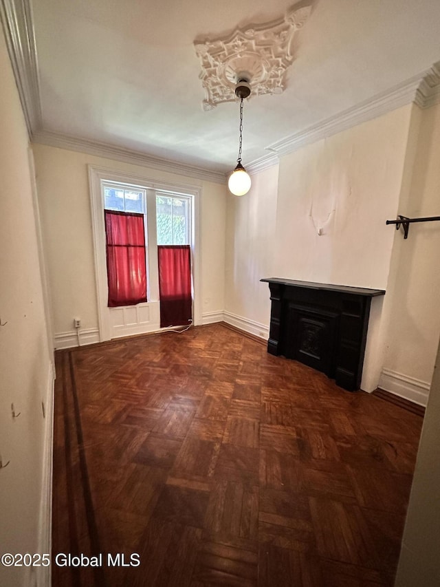 369 Madison Ave, Albany, NY 12210 - unfurnished living room featuring ornamental molding and baseboards