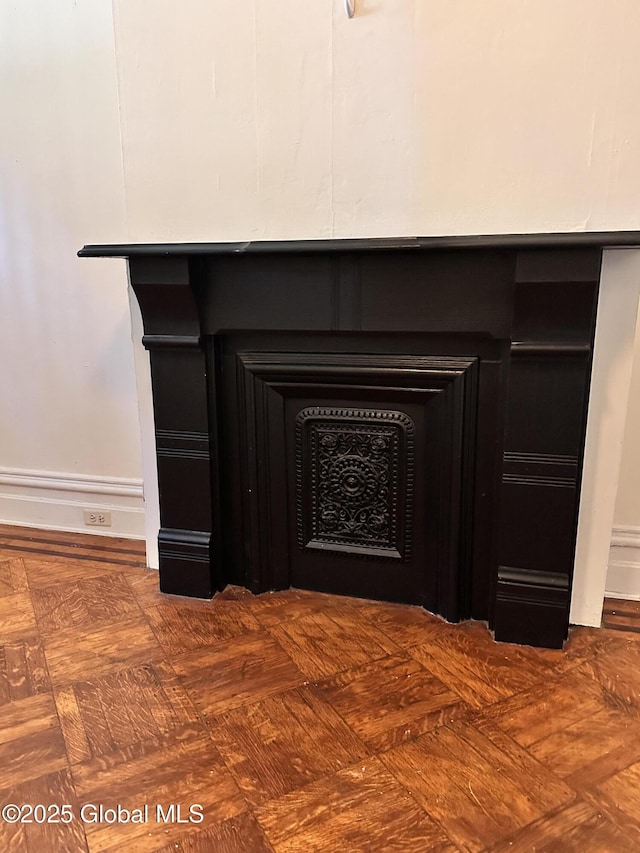 369 Madison Ave, Albany, NY 12210 - detailed view of a fireplace and baseboards