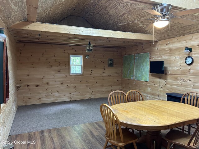 10 W Tucker Rd, Stony Creek, NY 12878 - dining room featuring wooden walls, wood finished floors, a ceiling fan, and vaulted ceiling
