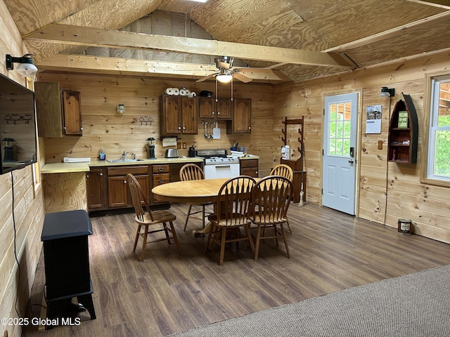 10 W Tucker Rd, Stony Creek, NY 12878 - dining area featuring wooden walls, dark wood-type flooring, ceiling fan, and vaulted ceiling