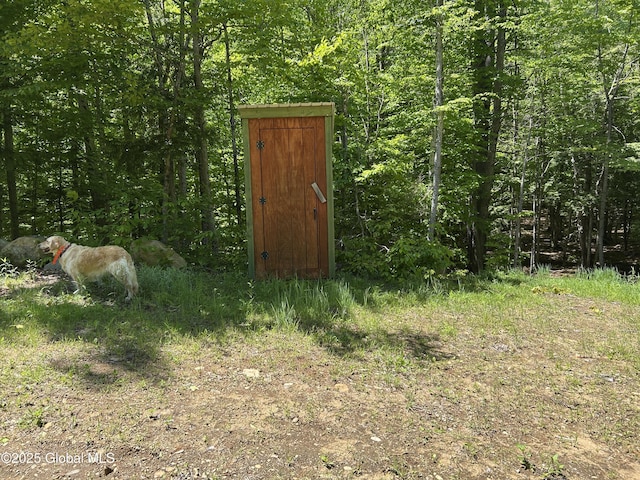 10 W Tucker Rd, Stony Creek, NY 12878 - view of outdoor structure featuring a forest view