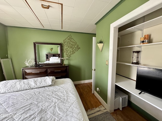 302 Pennsylvania Ave, Johnstown, NY 12095 - bedroom with wood finished floors and baseboards