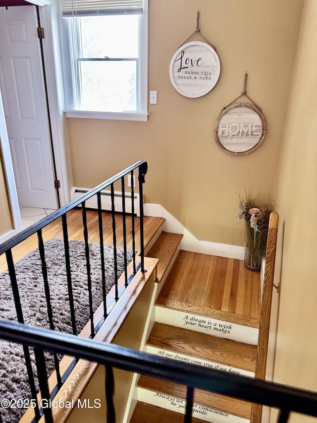 302 Pennsylvania Ave, Johnstown, NY 12095 - stairway featuring baseboards