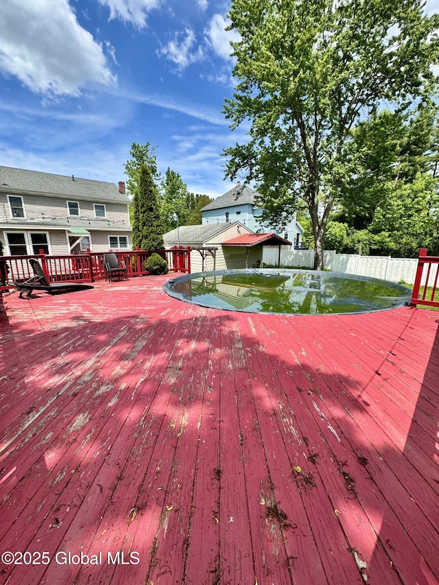 302 Pennsylvania Ave, Johnstown, NY 12095 - wooden deck featuring a fenced backyard
