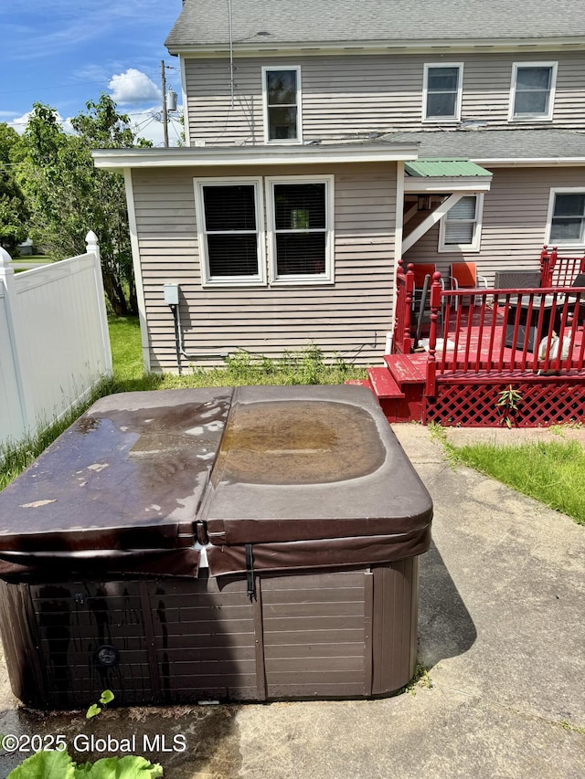 302 Pennsylvania Ave, Johnstown, NY 12095 - view of patio / terrace with a hot tub and a deck