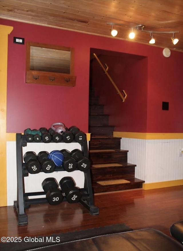 302 Pennsylvania Ave, Johnstown, NY 12095 - wine room with wood finished floors, a wainscoted wall, track lighting, and wood ceiling