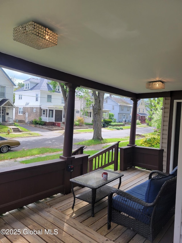 206 Catherine St, Scotia, NY 12302 - wooden porch featuring a residential view