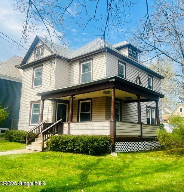 206 Catherine St, Scotia, NY 12302 - view of front of house with a porch and a front yard
