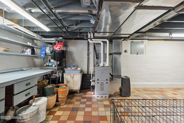 2400 Curry Rd, Schenectady, NY 12303 - unfinished below grade area featuring heating unit