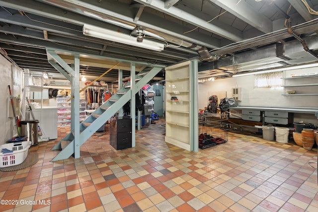 2400 Curry Rd, Schenectady, NY 12303 - below grade area featuring washing machine and dryer and stairway