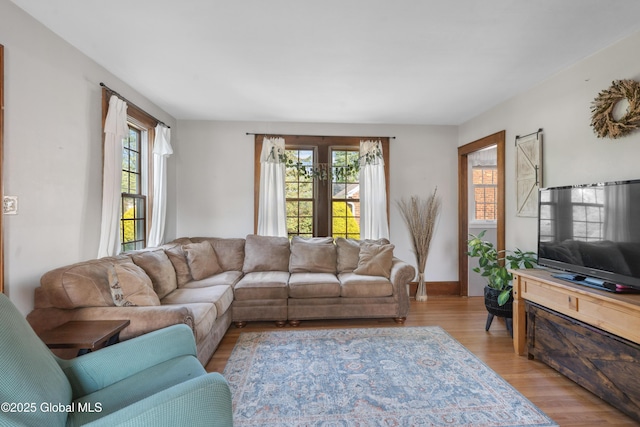 2400 Curry Rd, Schenectady, NY 12303 - living area with light wood-style flooring and baseboards