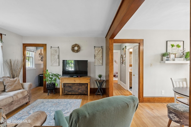 2400 Curry Rd, Schenectady, NY 12303 - living area featuring wood finished floors and baseboards