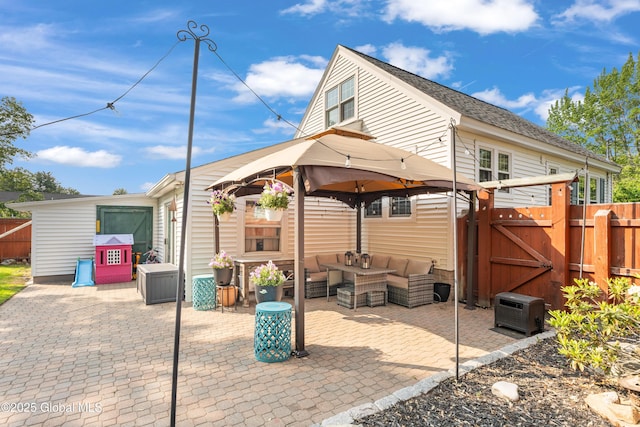 2400 Curry Rd, Schenectady, NY 12303 - view of patio with an outdoor living space, a gate, a gazebo, and a cooling unit