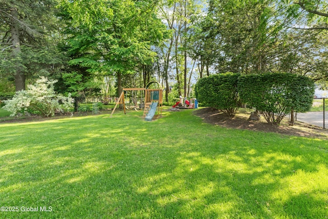 2400 Curry Rd, Schenectady, NY 12303 - view of green lawn with a playground