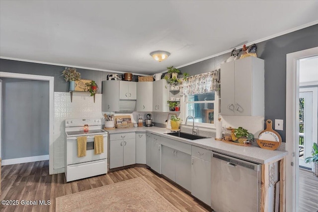 3287 Ny Highway 43, Sand Lake, NY 12018 - kitchen with white range with electric stovetop, a sink, stainless steel dishwasher, light countertops, and light wood-style floors
