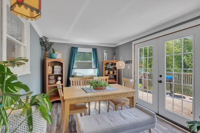 3287 Ny Highway 43, Sand Lake, NY 12018 - dining space with french doors, ornamental molding, and wood finished floors
