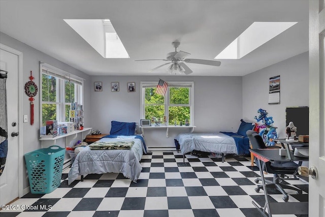 3287 Ny Highway 43, Sand Lake, NY 12018 - bedroom with a skylight, tile patterned floors, and ceiling fan