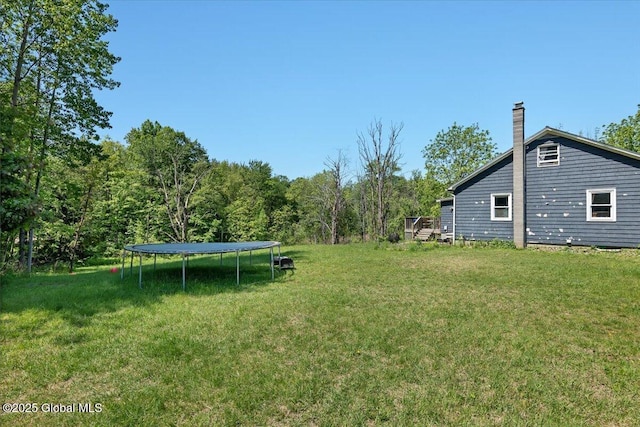 3287 Ny Highway 43, Sand Lake, NY 12018 - view of green lawn with a trampoline