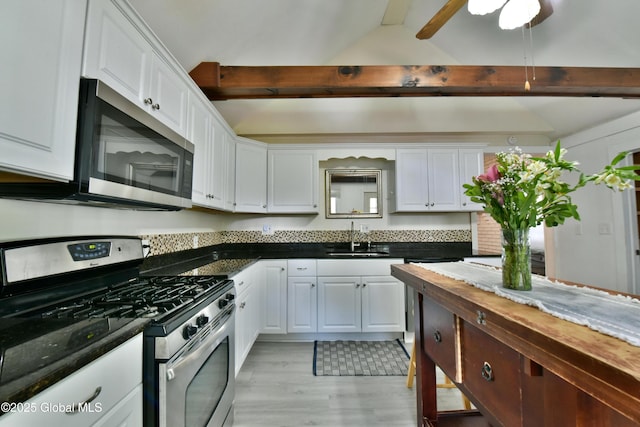 235 Maple Ave, Saratoga Springs, Inside, NY 12866 - kitchen featuring stainless steel appliances, white cabinets, dark countertops, and light wood finished floors