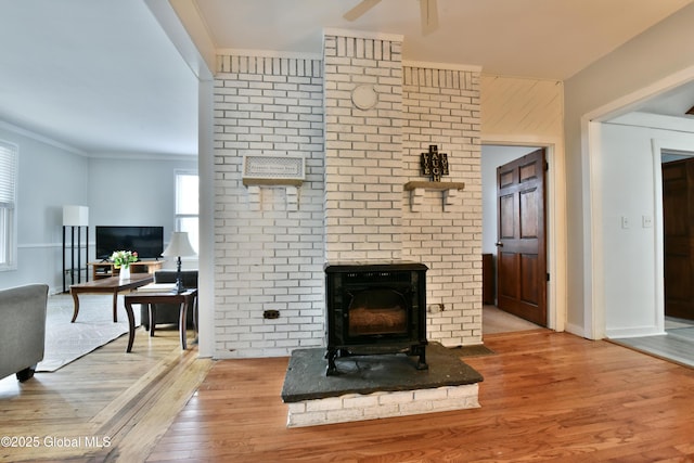 235 Maple Ave, Saratoga Springs, Inside, NY 12866 - living area featuring wood finished floors, ornamental molding, and ceiling fan