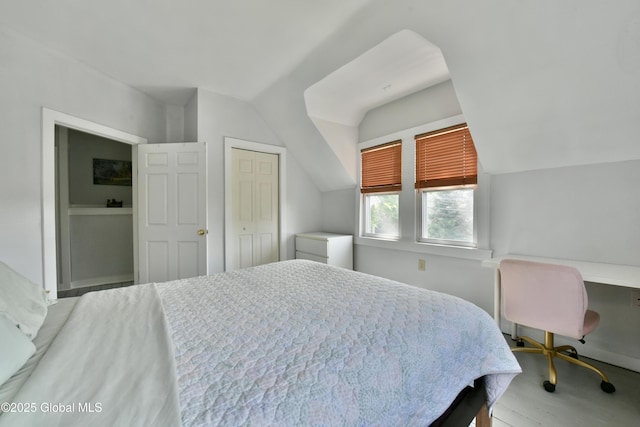 235 Maple Ave, Saratoga Springs, Inside, NY 12866 - bedroom with vaulted ceiling, wood finished floors, an office area, and a closet