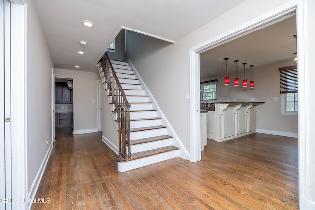 2 Darroch Rd, Bethlehem, NY 12054 - staircase featuring wood finished floors, baseboards, and recessed lighting
