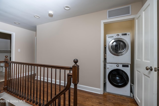 2 Darroch Rd, Bethlehem, NY 12054 - washroom with stacked washer / drying machine, wood finished floors, recessed lighting, and baseboards