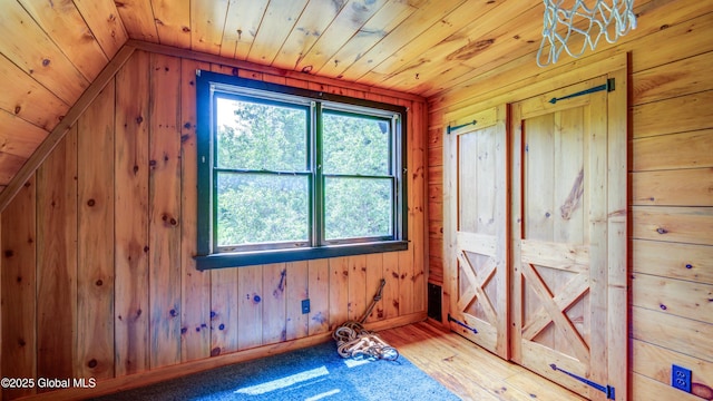 824 County Highway 106, Mayfield, NY 12010 - interior space with wooden walls, wooden ceiling, and lofted ceiling
