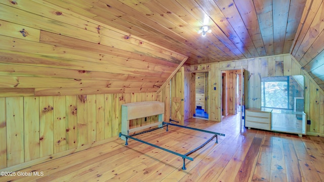 824 County Highway 106, Mayfield, NY 12010 - unfurnished bedroom with wooden ceiling, wooden walls, wood-type flooring, and vaulted ceiling