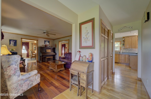 540 Mohawk Dr, Mohawk, NY 12068 - living area featuring light wood finished floors, a ceiling fan, and baseboards