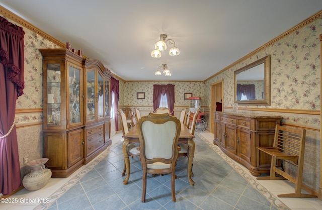 540 Mohawk Dr, Mohawk, NY 12068 - tiled dining room with wallpapered walls, a chandelier, crown molding, and a wainscoted wall