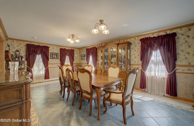 540 Mohawk Dr, Mohawk, NY 12068 - dining room featuring wallpapered walls, healthy amount of natural light, crown molding, tile patterned flooring, and a wainscoted wall