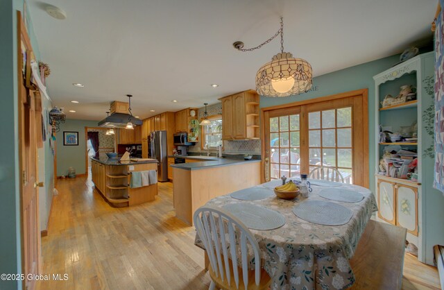 540 Mohawk Dr, Mohawk, NY 12068 - dining space with light wood-type flooring, recessed lighting, and french doors