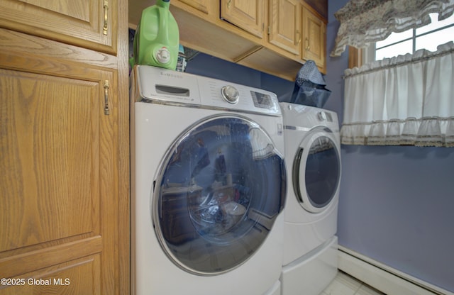 540 Mohawk Dr, Mohawk, NY 12068 - laundry area featuring a baseboard radiator, washing machine and dryer, and cabinet space