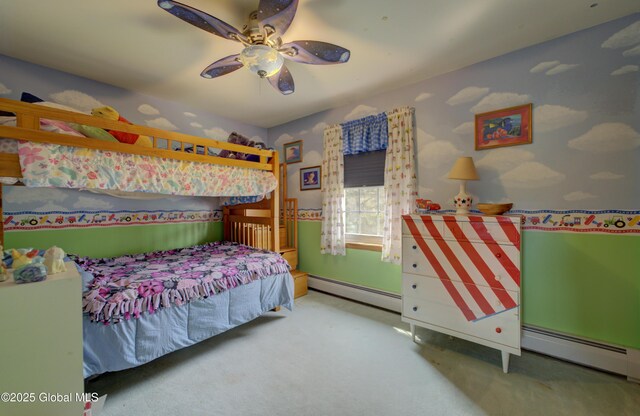 540 Mohawk Dr, Mohawk, NY 12068 - bedroom with a baseboard heating unit, carpet flooring, and a ceiling fan